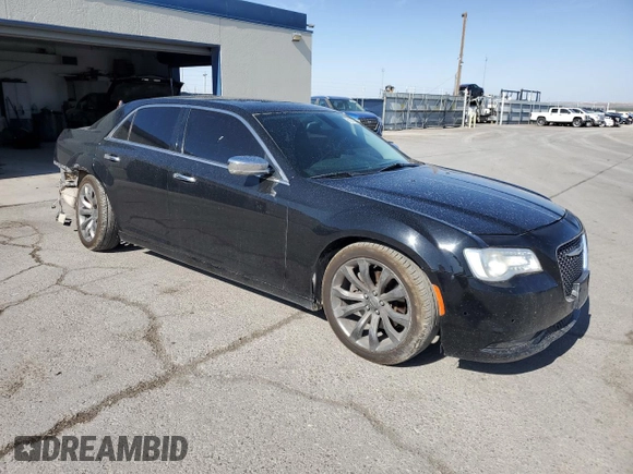 2015 Chrysler 300 C with VIN 2C3CCAET4FH772748, listed as a Copart auction lot 61331724 with 97,856 mi miles and Salvage Title. Bid and sale history available at DreamBid. Image 4.