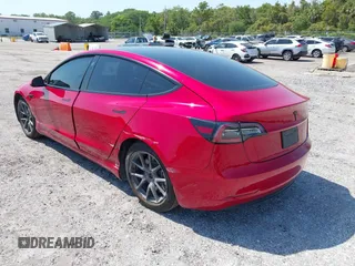 2022 Tesla Model 3 with VIN 5YJ3E1EA7NF152114, listed as a IAAI auction lot 42097399 with 96,726 mi miles. Bid and sale history available at carsss.com. Image 3.