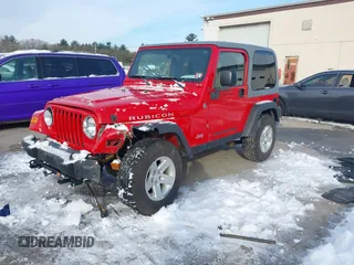 2005 Jeep Wrangler Rubicon with VIN 1J4FA69S25P316085, listed as a IAAI auction lot 41503034 with 57,252 mi miles. Bid and sale history available at carsss.com. Image 17.