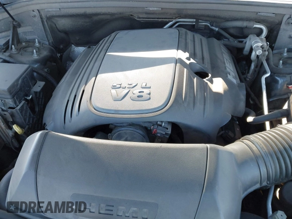 2015 Dodge Durango R/T with VIN 1C4SDHCT5FC937676, listed as a IAAI auction lot 41369508 with 107,075 mi miles and . Bid and sale history available at DreamBid. Image 10.