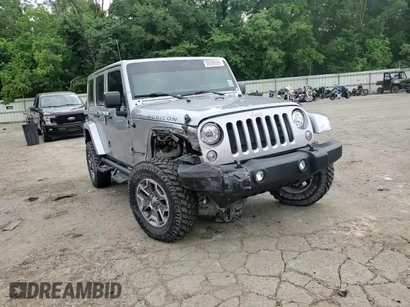 2018 Jeep Wrangler Unlimited Rubicon Recon z VIN 1C4HJWFGXJL840598, wystawiony jako Copart lot #59399595 z przebiegiem 63 298 mil mil oraz Szkoda całkowita • Salvage title. Historia ofert i sprzedaży dostępna na DreamBid. Obrazek 15.