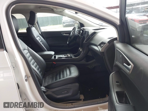 2021 Ford Edge SEL z VIN 2FMPK3J98MBA32220, wystawiony jako IAAI lot #41945825 z przebiegiem Nie podano mil oraz . Historia ofert i sprzedaży dostępna na DreamBid. Obrazek 5.
