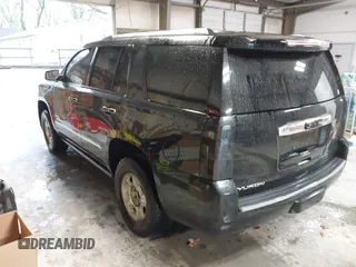 2015 GMC Yukon Denali with VIN 1GKS2CKJ4FR173703, listed as a IAAI auction lot 41943537 with 167,834 mi miles. Bid and sale history available at carsss.com. Image 3.