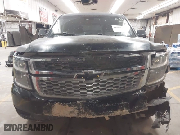 2015 Chevrolet Tahoe LT z VIN 1GNSCBKC1FR228488, wystawiony jako IAAI lot #41933869 z przebiegiem 164 523 mil mil oraz . Historia ofert i sprzedaży dostępna na DreamBid. Obrazek 13.