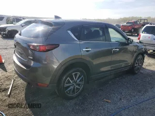 2018 Mazda CX-5 Touring with VIN JM3KFACM0J1430643, listed as a Copart auction lot 50725325 with 55,674 mi miles and Salvage Title. Bid and sale history available at carsss.com. Image 3.