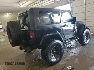 2009 Jeep Wrangler Sahara with VIN 1J4FA54159L772622, listed as a Copart auction lot 55648305 with 141,880 mi miles and Salvage title. Bid and sale history available at DreamBid. Image 3.