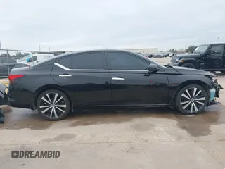 2019 Nissan Altima 2.5 Platinum with VIN 1N4BL4FV2KC207507, listed as a IAAI auction lot 41537675 with 69,872 mi miles. Bid and sale history available at carsss.com. Image 14.