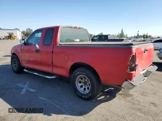 2000 Ford F-150 XL with VIN 1FTZX1721YNA67771, listed as a Copart auction lot 41439795 with 0 mi miles and Salvage Title. Bid and sale history available at carsss.com. Image 2.