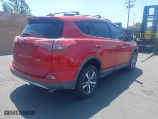 2016 Toyota RAV4 XLE with VIN 2T3WFREV3GW239632, listed as a IAAI auction lot 41860727 with 135,850 mi miles. Bid and sale history available at carsss.com. Image 4.