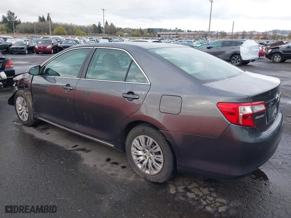 2013 Toyota Camry Hybrid LE with VIN 4T1BD1FK5DU083849, listed as a IAAI auction lot 40916318 with 204,058 mi miles. Bid and sale history available at carsss.com. Image 3.