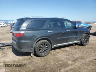 2013 Dodge Durango Crew with VIN 1C4RDJDG5DC701016, listed as a Copart auction lot 60832385 with 236,719 mi miles and Salvage title. Bid and sale history available at DreamBid. Image 3.
