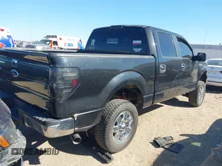 2010 Ford F-150 XL with VIN 1FTFW1EV0AFD25037, listed as a IAAI auction lot 41804877 with 200,548 mi miles. Bid and sale history available at carsss.com. Image 4.