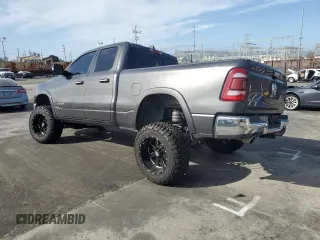 2020 Ram 1500 Laramie with VIN 1C6SRFDT1LN263036, listed as a Copart auction lot 48560655 with 130,923 mi miles and Salvage Title. Bid and sale history available at carsss.com. Image 2.