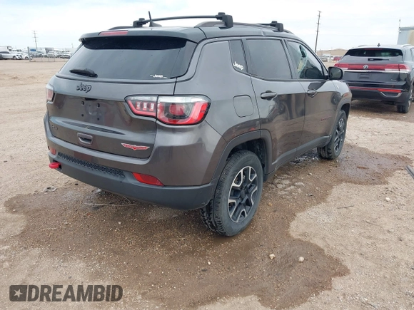 2019 Jeep Compass Trailhawk with VIN 3C4NJDDBXKT795294, listed as a IAAI auction lot 42046344 with 100,395 mi miles and . Bid and sale history available at DreamBid. Image 4.