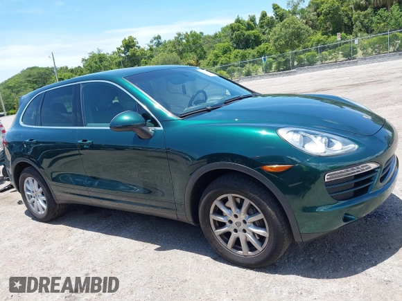 2014 Porsche Cayenne with VIN WP1AA2A21ELA06570, listed as a IAAI auction lot 42473298 with 61,421 mi miles and . Bid and sale history available at DreamBid. Image 14.