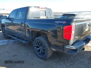2015 Chevrolet Silverado 1500 LT with VIN 3GCUKREC8FG309500, listed as a IAAI auction lot 41568103 with 174,211 mi miles and . Bid and sale history available at DreamBid. Image 3.