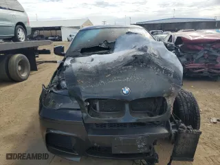 2011 BMW X6 M with VIN 5YMGZ0C54BLK13876, listed as a Copart auction lot 68567774 with 0 mi miles and Salvage Title. Bid and sale history available at carsss.com. Image 5.