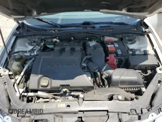 2010 Lincoln MKZ z VIN 3LNHL2GC0AR656881, wystawiony jako Copart lot #57591735 z przebiegiem 76 596 mil mil oraz Szkoda całkowita • Salvage title. Historia ofert i sprzedaży dostępna na DreamBid. Obrazek 11.