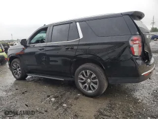 2021 Chevrolet Tahoe LS with VIN 1GNSCMKD4MR335973, listed as a Copart auction lot 69972594 with 42,129 mi miles and Salvage Title. Bid and sale history available at carsss.com. Image 2.