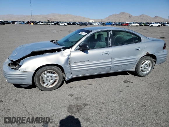1999 Pontiac Grand Am SE2 with VIN 1G2NE52E5XM826878, listed as a Copart auction lot 77351164 with 241,463 mi miles and Salvage Title. Bid and sale history available at carsss.com. Image 1.