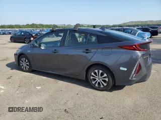 2021 Toyota Prius LE with VIN JTDKAMFP3M3166034, listed as a Copart auction lot 63271275 with 52,536 mi miles and Salvage title. Bid and sale history available at DreamBid. Image 2.