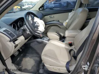 2010 Mitsubishi Outlander GT with VIN JA4JT5AX7AZ007961, listed as a Copart auction lot 49926875 with 172,033 mi miles and Salvage Title. Bid and sale history available at carsss.com. Image 7.