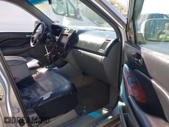 2004 Acura MDX Touring Pkg with VIN 2HNYD18694H521669, listed as a IAAI auction lot 42040542 with 294,325 mi miles. Bid and sale history available at carsss.com. Image 5.