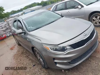 2016 Kia Optima LX z VIN 5XXGT4L35GG022734, wystawiony jako IAAI lot #42283783 z przebiegiem 155 467 mil mil oraz . Historia ofert i sprzedaży dostępna na DreamBid. Obrazek 1.