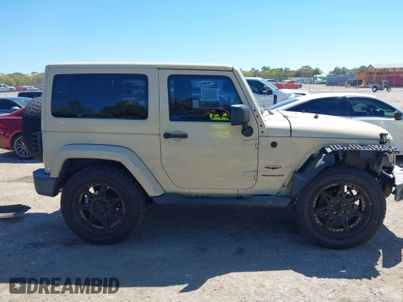 2011 Jeep Wrangler Sahara with VIN 1J4AA5D13BL562732, listed as a IAAI auction lot 41838520 with 148,359 mi miles and . Bid and sale history available at DreamBid. Image 14.