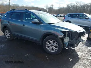 2012 Mazda CX-9 Touring with VIN JM3TB3CV5C0363504, listed as a IAAI auction lot 41526423 with 199,261 mi miles and . Bid and sale history available at carsss.com. Image 1.