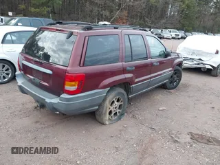 2001 Jeep Grand Cherokee Laredo z VIN 1J4GX48S41C585151, wystawiony jako IAAI lot #41020660 z przebiegiem Nie podano mil oraz . Historia ofert i sprzedaży dostępna na DreamBid. Obrazek 4.