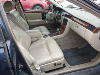 1993 Cadillac Seville Touring STS z VIN 1G6KY5297PU804313, wystawiony jako IAAI lot #42001104 z przebiegiem 242 756 mil mil oraz . Historia ofert i sprzedaży dostępna na DreamBid. Obrazek 5.