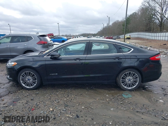 2014 Ford Fusion SE Hybrid with VIN 3FA6P0LU2ER133294, listed as a IAAI auction lot 41696064 with 150,537 mi miles. Bid and sale history available at carsss.com. Image 14.