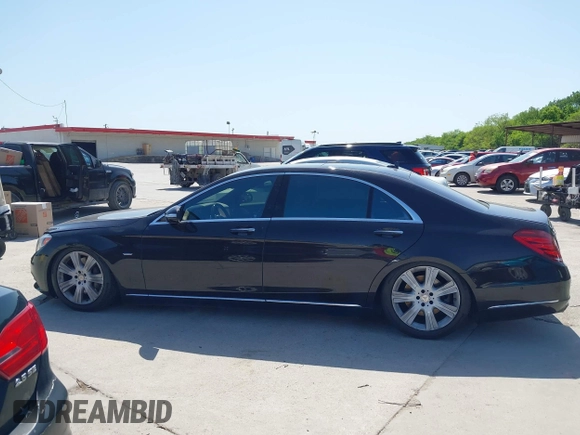 2014 Mercedes-Benz S-Class S 550 with VIN WDDUG8CB9EA009280, listed as a IAAI auction lot 42001730 with 217,213 mi miles. Bid and sale history available at carsss.com. Image 14.