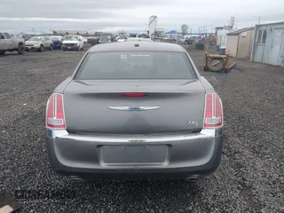 2011 Chrysler 300 with VIN 2C3CA6CT8BH547555, listed as a IAAI auction lot 41858626 with 141,853 mi miles. Bid and sale history available at carsss.com. Image 16.