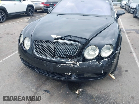 2005 Bentley Continental GT GT z VIN SCBCR63W55C025099, wystawiony jako IAAI lot #42208951 z przebiegiem 123 712 mil mil oraz . Historia ofert i sprzedaży dostępna na DreamBid. Obrazek 6.