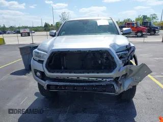 2023 Toyota Tacoma SR z VIN 3TMCZ5AN0PM627654, wystawiony jako IAAI lot #42157641 z przebiegiem 35 015 mil mil oraz . Historia ofert i sprzedaży dostępna na DreamBid. Obrazek 13.