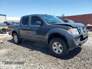 2013 Nissan Frontier SV with VIN 1N6AD0EV8DN762611, listed as a Copart auction lot 57712345 with 117,792 mi miles and Salvage title. Bid and sale history available at DreamBid. Image 4.