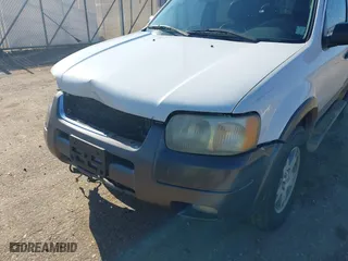 2004 Ford Escape XLT with VIN 1FMYU93174KA45992, listed as a IAAI auction lot 41169340 with 308,987 mi miles. Bid and sale history available at carsss.com. Image 14.