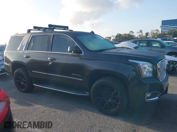 2015 GMC Yukon Denali z VIN 1GKS1CKJ7FR566419, wystawiony jako IAAI lot #41948825 z przebiegiem 235 037 mil mil oraz . Historia ofert i sprzedaży dostępna na DreamBid. Obrazek 13.