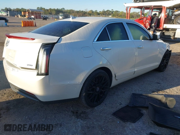 2014 Cadillac ATS Standard RWD z VIN 1G6AA5RA7E0128501, wystawiony jako IAAI lot #41780110 z przebiegiem 78 367 mil mil oraz . Historia ofert i sprzedaży dostępna na DreamBid. Obrazek 4.