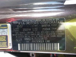 2018 Kia Optima LX with VIN KNAGT4L35J5238723, listed as a IAAI auction lot 41702109 with 66,620 mi miles. Bid and sale history available at carsss.com. Image 9.
