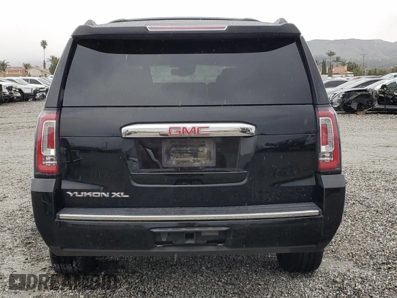 2016 GMC Yukon XL Denali with VIN 1GKS2HKJ1GR199710, listed as a Copart auction lot 49172615 with 261,856 mi miles and Salvage Title. Bid and sale history available at DreamBid. Image 6.