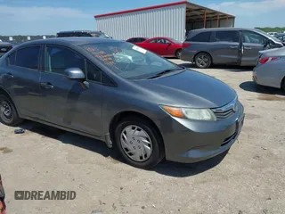2012 Honda Civic LX z VIN 19XFB2F57CE012290, wystawiony jako IAAI lot #42030870 z przebiegiem 191 886 mil mil oraz . Historia ofert i sprzedaży dostępna na DreamBid. Obrazek 1.