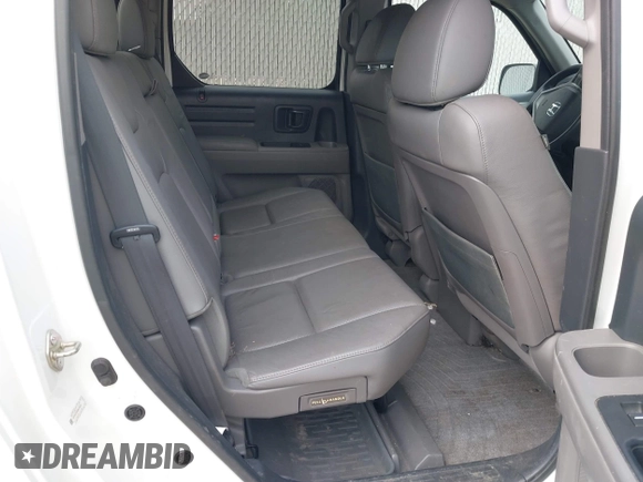 2013 Honda Ridgeline RTL with VIN 5FPYK1F58DB018542, listed as a IAAI auction lot 42465817 with 112,898 mi miles and . Bid and sale history available at DreamBid. Image 8.