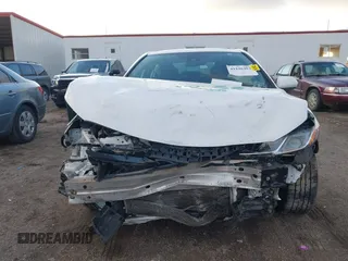 2019 Toyota Camry LE z VIN 4T1B11HK1KU804266, wystawiony jako IAAI lot #41226403 z przebiegiem 91 163 mil mil oraz . Historia ofert i sprzedaży dostępna na DreamBid. Obrazek 13.