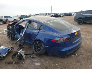 2021 Tesla Model S Long Range with VIN 5YJSA1E50MF432224, listed as a IAAI auction lot 41417130 with Not provided miles and . Bid and sale history available at DreamBid. Image 14.