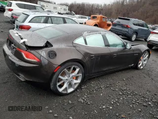 2018 Karma Revero z VIN 50GK41SA0JA000037, wystawiony jako Copart lot #49378945 z przebiegiem Nie podano mil oraz Nie do naprawy. Historia ofert i sprzedaży dostępna na DreamBid. Obrazek 3.