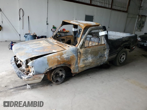 1996 Ford Ranger XL z VIN 1FTCR10A3TPB51735, wystawiony jako Copart lot #55229865 z przebiegiem Nie podano mil oraz Szkoda całkowita • Salvage title. Historia ofert i sprzedaży dostępna na DreamBid. Obrazek 1.