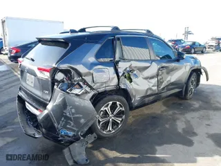 2021 Toyota RAV4 Prime XSE with VIN JTMFB3FV7MD009740, listed as a IAAI auction lot 41666510 with 59,950 mi miles. Bid and sale history available at carsss.com. Image 4.